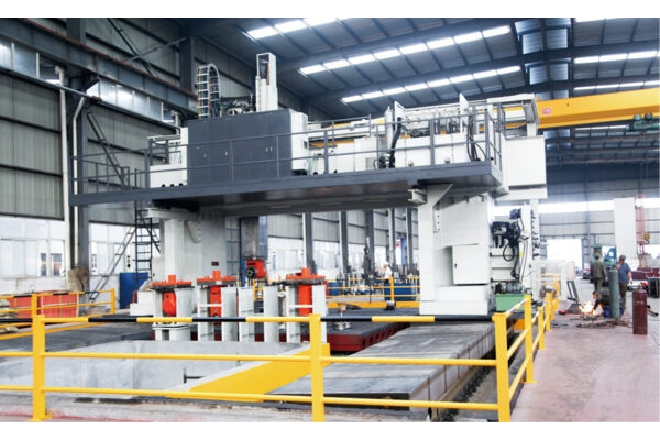 Fixed beam gantry mobile machining center